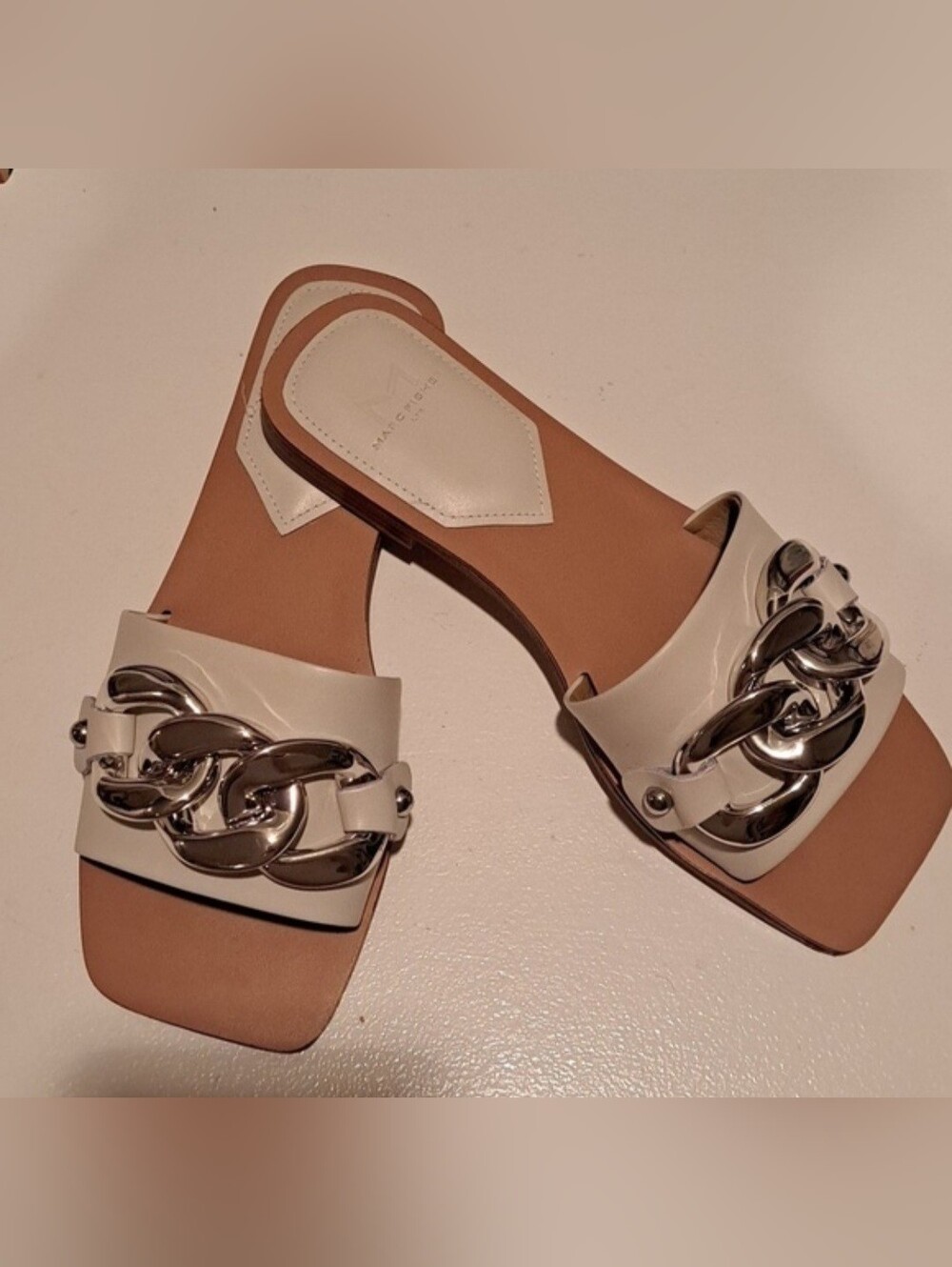 Marc Fisher Rosely Ivory Colored Leathers Slides With Silver Chain Accent